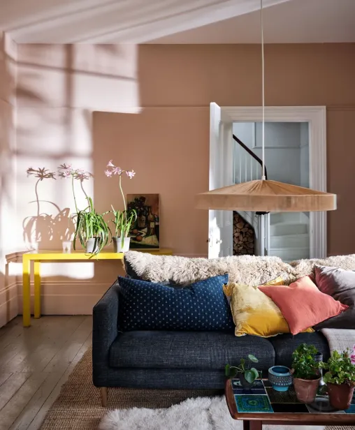 According to Interior Designers, there are 5 Colors that will make your Living Room feel happy